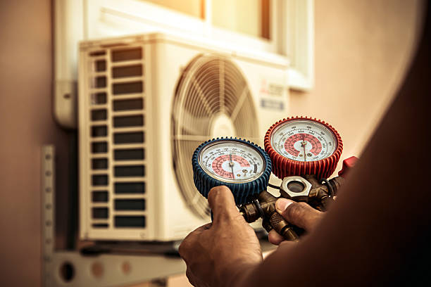Professional Ac Installation technician working in Monroe City, IN